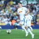 Max Wöber in action for Leeds United, focused and determined during a match.