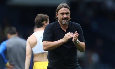 Daniel Farke clapping and showing appreciation after a Leeds United match.