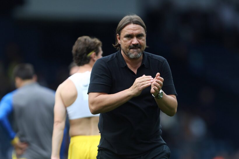 Daniel Farke clapping and showing appreciation after a Leeds United match.